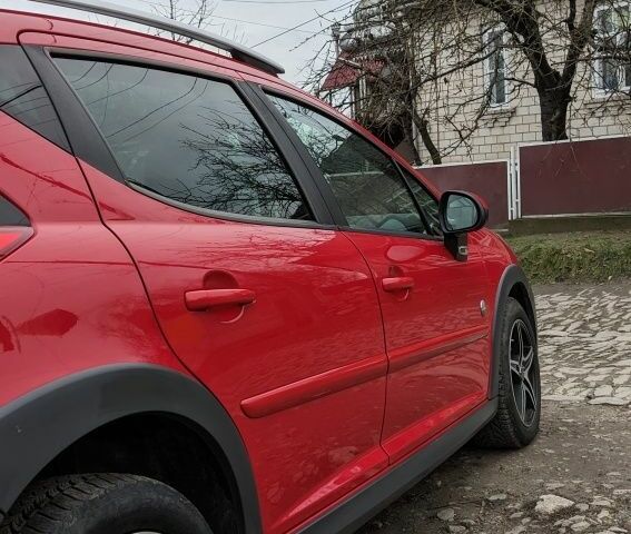 Красный Пежо 207, объемом двигателя 1.6 л и пробегом 230 тыс. км за 5300 $, фото 14 на Automoto.ua