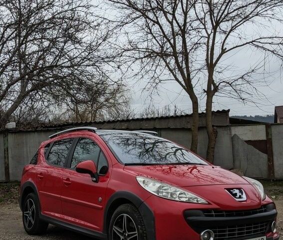 Красный Пежо 207, объемом двигателя 1.6 л и пробегом 230 тыс. км за 5300 $, фото 5 на Automoto.ua