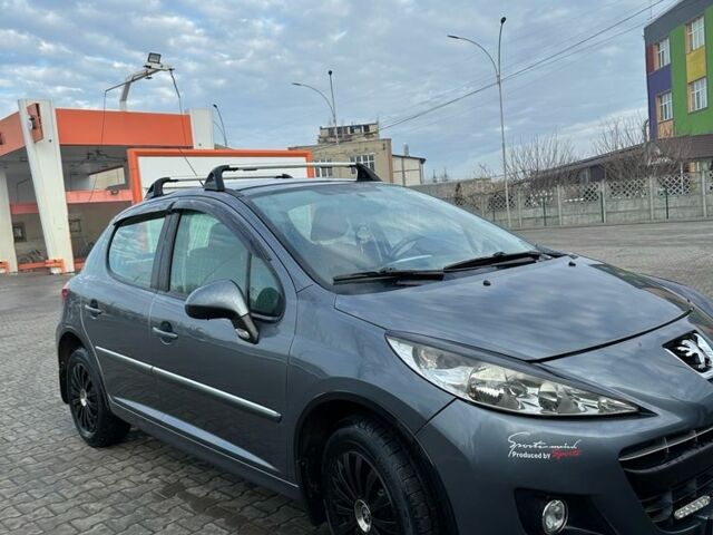 Серый Пежо 207, объемом двигателя 1.6 л и пробегом 286 тыс. км за 4400 $, фото 2 на Automoto.ua