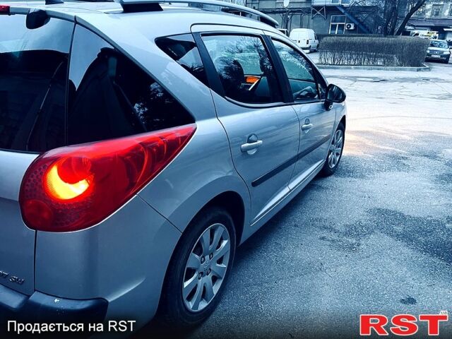 Серый Пежо 207, объемом двигателя 1.6 л и пробегом 217 тыс. км за 5600 $, фото 2 на Automoto.ua