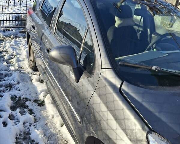 Серый Пежо 207, объемом двигателя 1.56 л и пробегом 393 тыс. км за 2300 $, фото 1 на Automoto.ua