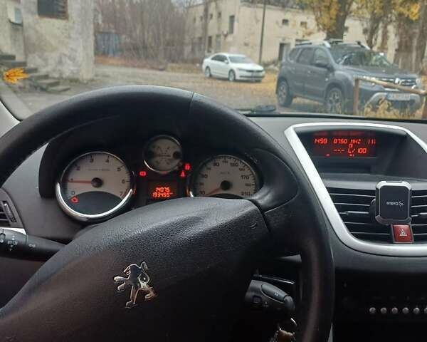 Синий Пежо 207, объемом двигателя 1.36 л и пробегом 193 тыс. км за 4500 $, фото 10 на Automoto.ua