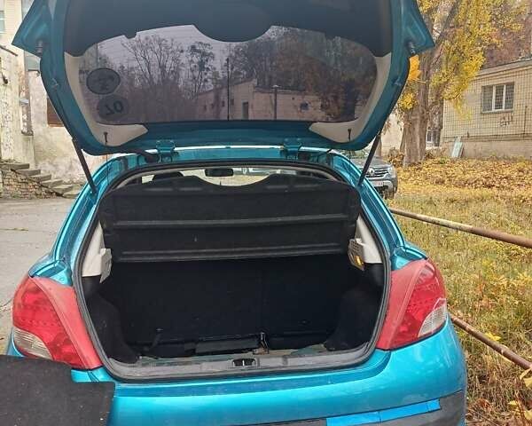 Синий Пежо 207, объемом двигателя 1.36 л и пробегом 193 тыс. км за 4500 $, фото 6 на Automoto.ua