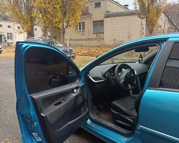 Синий Пежо 207, объемом двигателя 1.36 л и пробегом 193 тыс. км за 4500 $, фото 11 на Automoto.ua