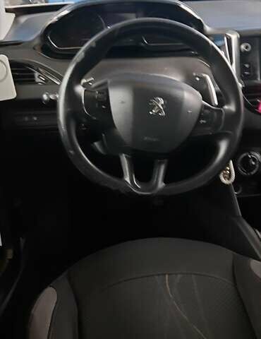 Білий Пежо 208, об'ємом двигуна 1.4 л та пробігом 259 тис. км за 7100 $, фото 10 на Automoto.ua