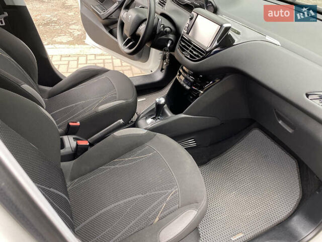 Білий Пежо 208, об'ємом двигуна 1.4 л та пробігом 255 тис. км за 7100 $, фото 20 на Automoto.ua