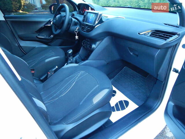 Пежо 208 2012 в Трускавце на Automoto.ua Белый Пежо 208, объемом двигателя 1.4 л и пробегом 160 тыс. км за 5890 $, фото 63 на Automoto.ua