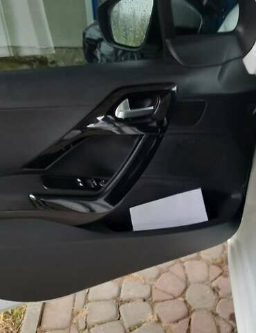 Білий Пежо 208, об'ємом двигуна 1.4 л та пробігом 259 тис. км за 7100 $, фото 8 на Automoto.ua