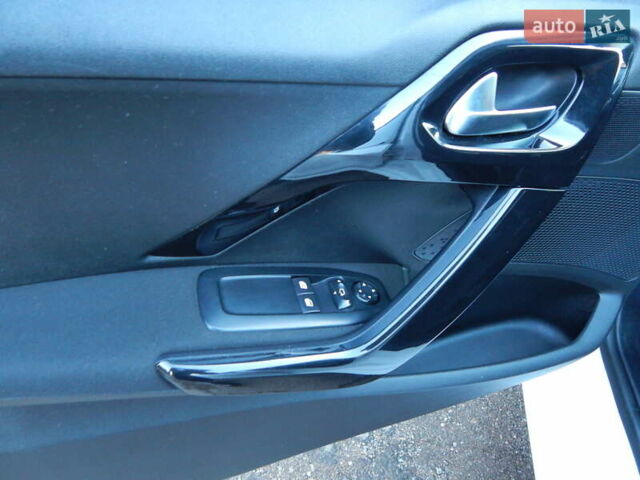 Пежо 208 2012 в Трускавце на Automoto.ua Белый Пежо 208, объемом двигателя 1.4 л и пробегом 160 тыс. км за 5890 $, фото 56 на Automoto.ua