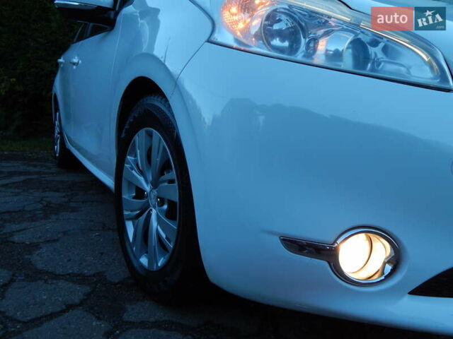 Пежо 208 2012 в Трускавце на Automoto.ua Белый Пежо 208, объемом двигателя 1.4 л и пробегом 160 тыс. км за 5890 $, фото 10 на Automoto.ua