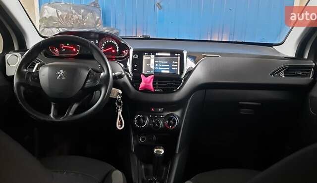Білий Пежо 208, об'ємом двигуна 1.4 л та пробігом 259 тис. км за 7100 $, фото 18 на Automoto.ua