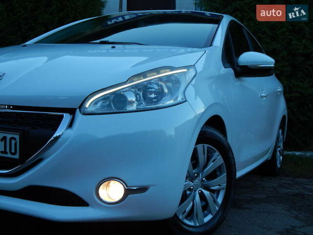 Пежо 208 2012 в Трускавце на Automoto.ua Белый Пежо 208, объемом двигателя 1.4 л и пробегом 160 тыс. км за 5890 $, фото 19 на Automoto.ua