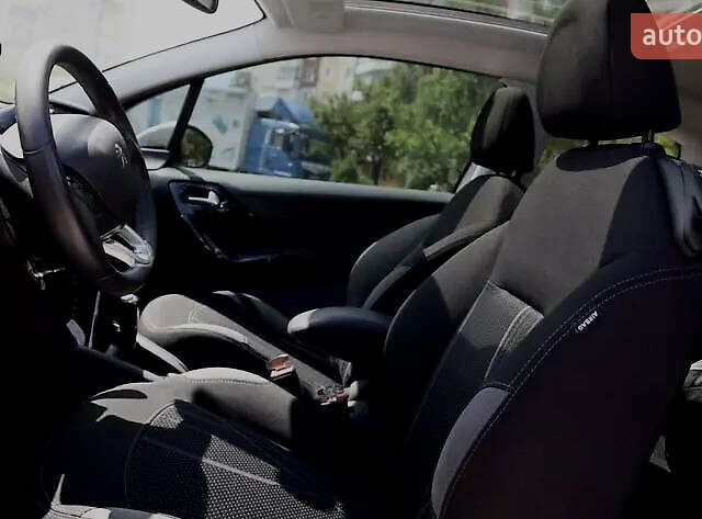 Білий Пежо 208, об'ємом двигуна 1.6 л та пробігом 77 тис. км за 8800 $, фото 5 на Automoto.ua