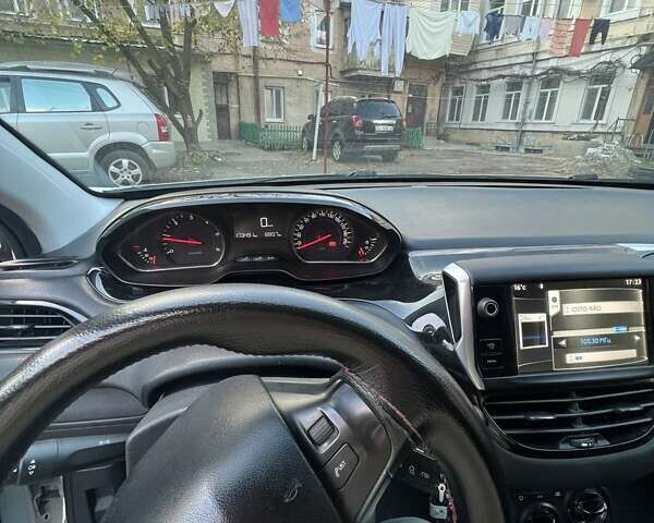 Пежо 208 2013 в Одессе на Automoto.ua Белый Пежо 208, объемом двигателя 1.56 л и пробегом 190 тыс. км за 4999 $, фото 6 на Automoto.ua
