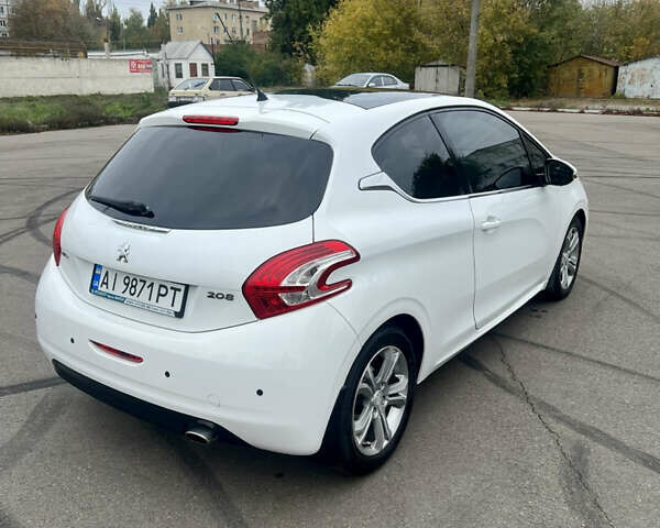 Білий Пежо 208, об'ємом двигуна 1.6 л та пробігом 77 тис. км за 8800 $, фото 18 на Automoto.ua