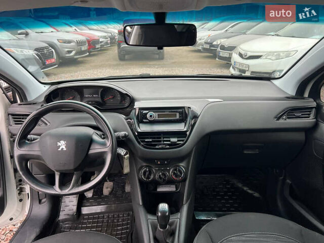 Белый Пежо 208, объемом двигателя 1 л и пробегом 116 тыс. км за 5800 $, фото 15 на Automoto.ua