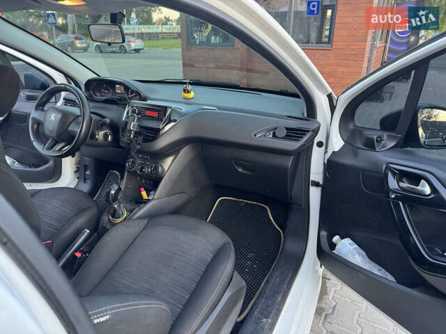 Белый Пежо 208, объемом двигателя 1.56 л и пробегом 171 тыс. км за 7800 $, фото 10 на Automoto.ua