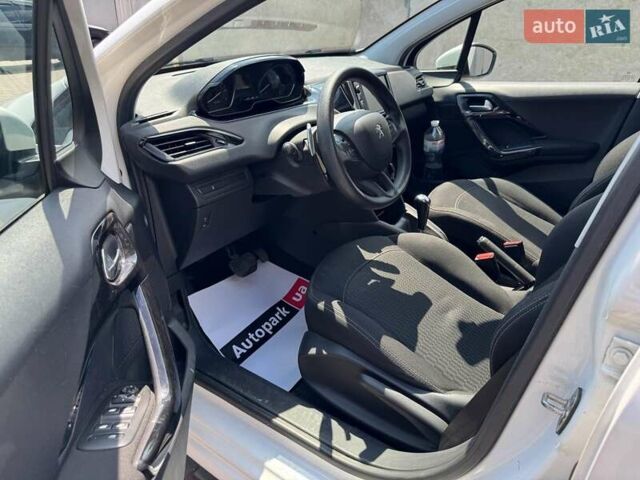 Белый Пежо 208, объемом двигателя 1.2 л и пробегом 126 тыс. км за 9990 $, фото 8 на Automoto.ua