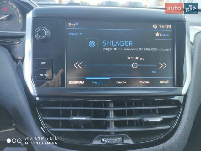 Белый Пежо 208, объемом двигателя 1.2 л и пробегом 80 тыс. км за 8150 $, фото 11 на Automoto.ua