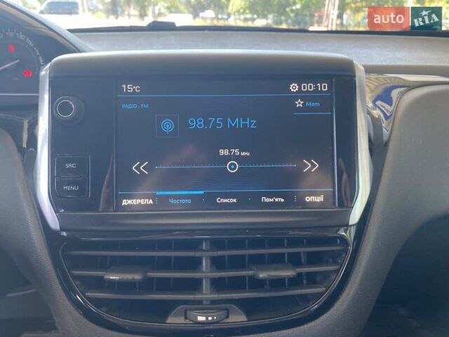 Белый Пежо 208, объемом двигателя 1.2 л и пробегом 76 тыс. км за 8200 $, фото 21 на Automoto.ua