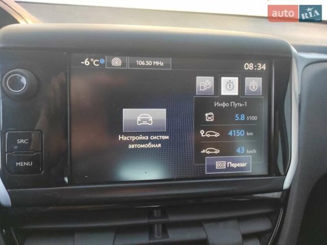 Белый Пежо 208, объемом двигателя 1.2 л и пробегом 115 тыс. км за 8000 $, фото 3 на Automoto.ua