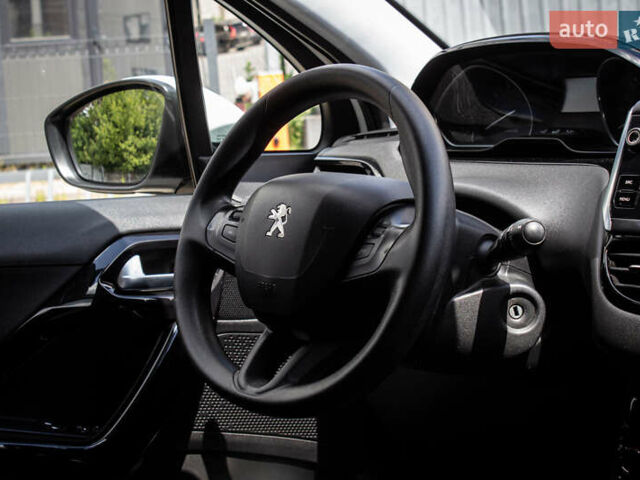 Белый Пежо 208, объемом двигателя 1.2 л и пробегом 106 тыс. км за 7500 $, фото 23 на Automoto.ua