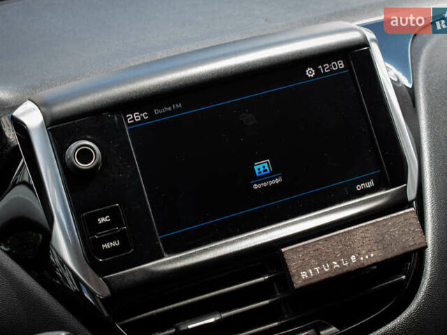 Белый Пежо 208, объемом двигателя 1.2 л и пробегом 106 тыс. км за 7500 $, фото 9 на Automoto.ua