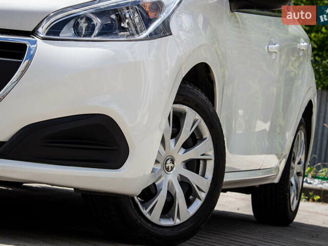 Белый Пежо 208, объемом двигателя 1.2 л и пробегом 106 тыс. км за 7500 $, фото 35 на Automoto.ua