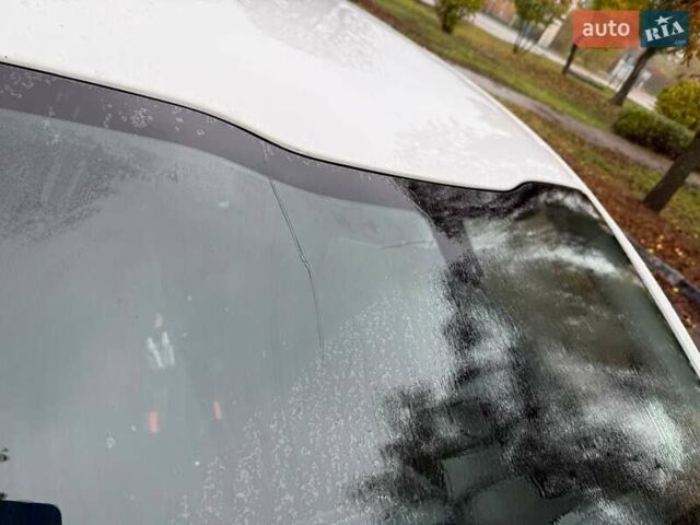 Белый Пежо 208, объемом двигателя 1.2 л и пробегом 178 тыс. км за 7000 $, фото 11 на Automoto.ua