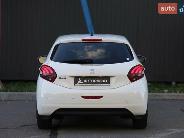 Белый Пежо 208, объемом двигателя 1.5 л и пробегом 55 тыс. км за 12000 $, фото 5 на Automoto.ua