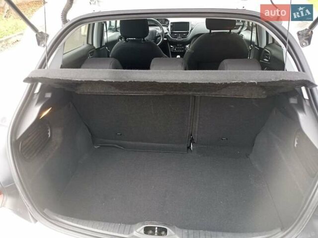 Белый Пежо 208, объемом двигателя 1.5 л и пробегом 84 тыс. км за 9400 $, фото 7 на Automoto.ua