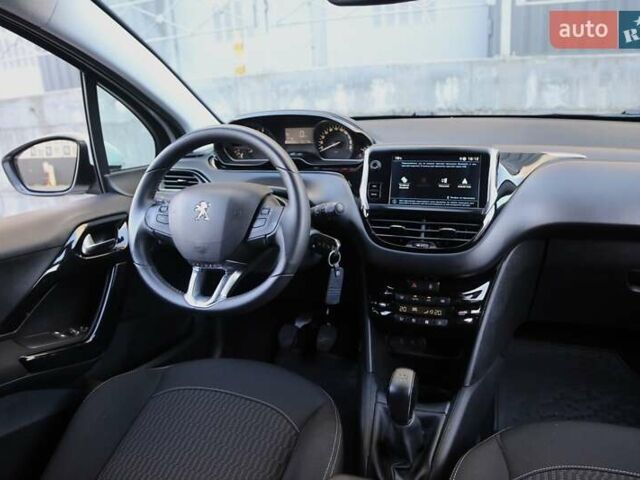 Белый Пежо 208, объемом двигателя 1.5 л и пробегом 55 тыс. км за 12000 $, фото 11 на Automoto.ua