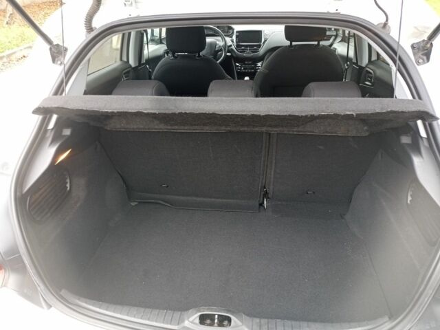 Белый Пежо 208, объемом двигателя 1.5 л и пробегом 84 тыс. км за 9400 $, фото 8 на Automoto.ua