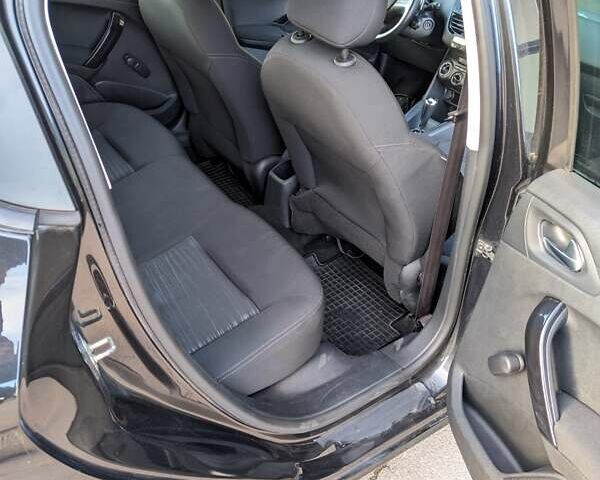 Чорний Пежо 208, об'ємом двигуна 1.4 л та пробігом 189 тис. км за 7000 $, фото 10 на Automoto.ua