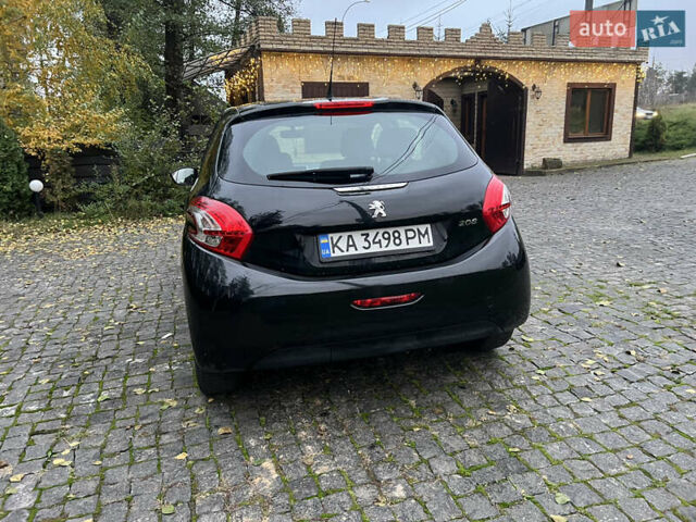 Черный Пежо 208, объемом двигателя 1.4 л и пробегом 200 тыс. км за 6200 $, фото 6 на Automoto.ua