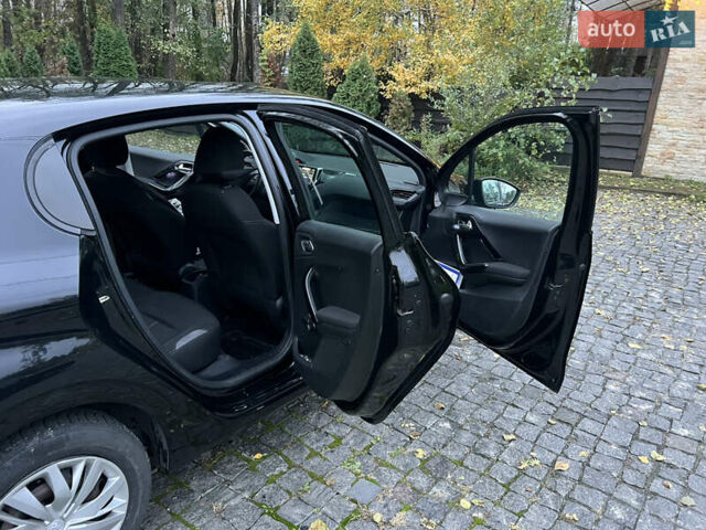 Черный Пежо 208, объемом двигателя 1.4 л и пробегом 200 тыс. км за 6200 $, фото 11 на Automoto.ua