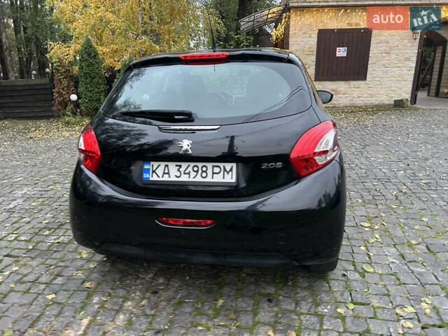 Черный Пежо 208, объемом двигателя 1.4 л и пробегом 200 тыс. км за 6200 $, фото 3 на Automoto.ua