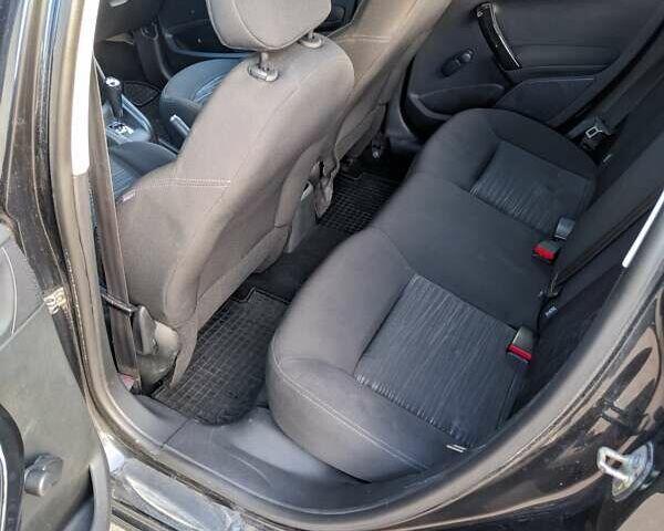 Чорний Пежо 208, об'ємом двигуна 1.4 л та пробігом 189 тис. км за 7000 $, фото 12 на Automoto.ua