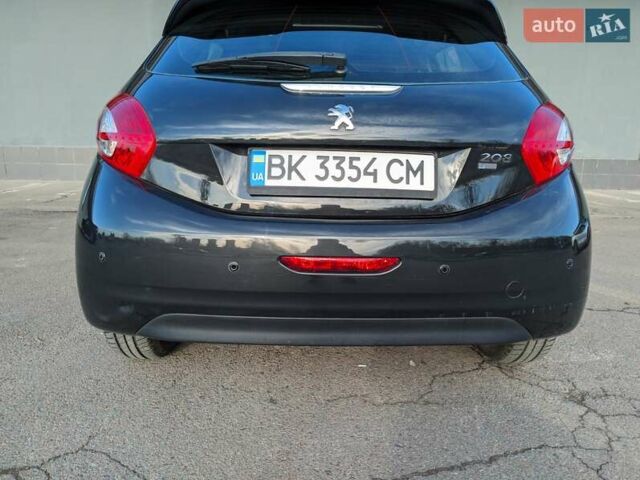 Чорний Пежо 208, об'ємом двигуна 1.4 л та пробігом 189 тис. км за 7000 $, фото 8 на Automoto.ua