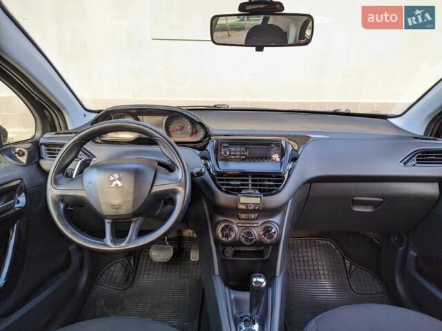 Чорний Пежо 208, об'ємом двигуна 1.4 л та пробігом 189 тис. км за 7000 $, фото 9 на Automoto.ua