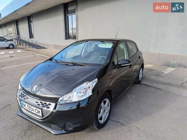 Чорний Пежо 208, об'ємом двигуна 1.4 л та пробігом 189 тис. км за 7000 $, фото 2 на Automoto.ua