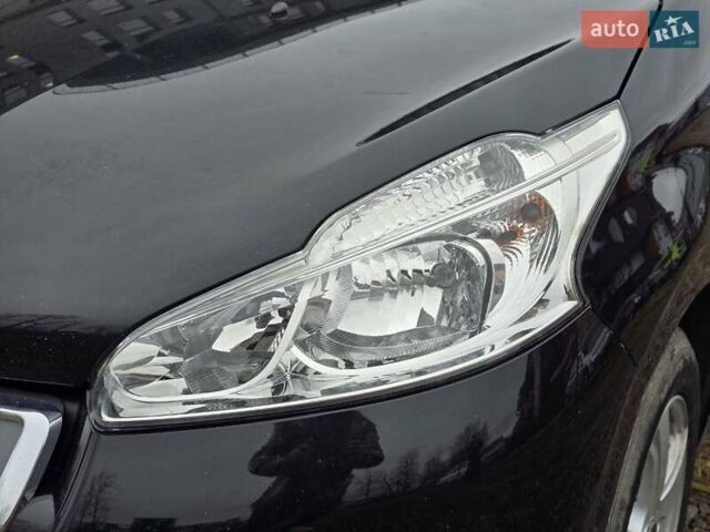 Черный Пежо 208, объемом двигателя 1.4 л и пробегом 189 тыс. км за 7500 $, фото 5 на Automoto.ua