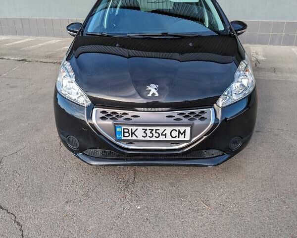 Чорний Пежо 208, об'ємом двигуна 1.4 л та пробігом 189 тис. км за 7000 $, фото 3 на Automoto.ua