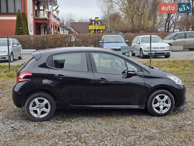 Черный Пежо 208, объемом двигателя 1.4 л и пробегом 189 тыс. км за 7500 $, фото 2 на Automoto.ua