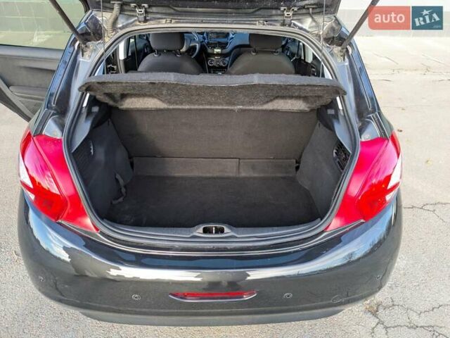 Чорний Пежо 208, об'ємом двигуна 1.4 л та пробігом 189 тис. км за 7000 $, фото 14 на Automoto.ua