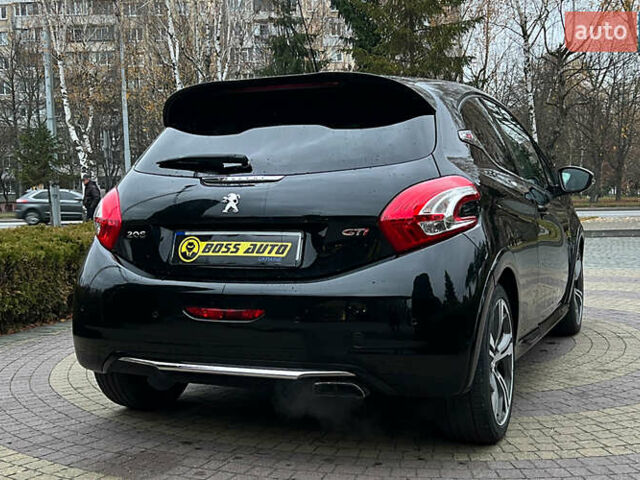 Черный Пежо 208, объемом двигателя 1.6 л и пробегом 130 тыс. км за 13650 $, фото 6 на Automoto.ua