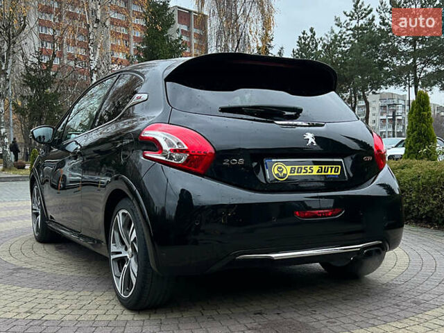 Черный Пежо 208, объемом двигателя 1.6 л и пробегом 130 тыс. км за 13650 $, фото 4 на Automoto.ua
