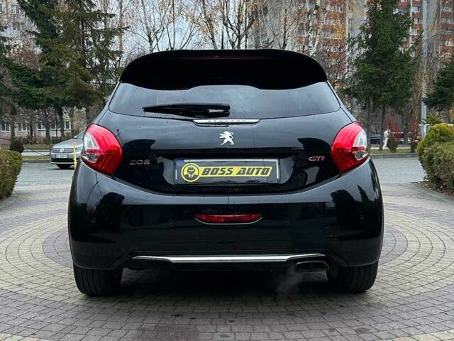 Черный Пежо 208, объемом двигателя 1.6 л и пробегом 130 тыс. км за 13650 $, фото 5 на Automoto.ua