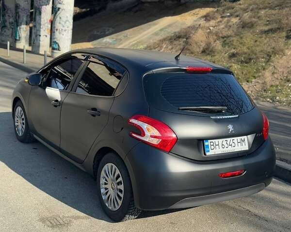 Черный Пежо 208, объемом двигателя 1.6 л и пробегом 123 тыс. км за 7200 $, фото 3 на Automoto.ua