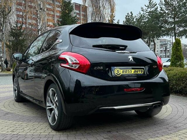 Черный Пежо 208, объемом двигателя 1.6 л и пробегом 130 тыс. км за 13650 $, фото 4 на Automoto.ua